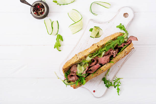 Image de la recette de Sandwich bœuf, concombre, roquette