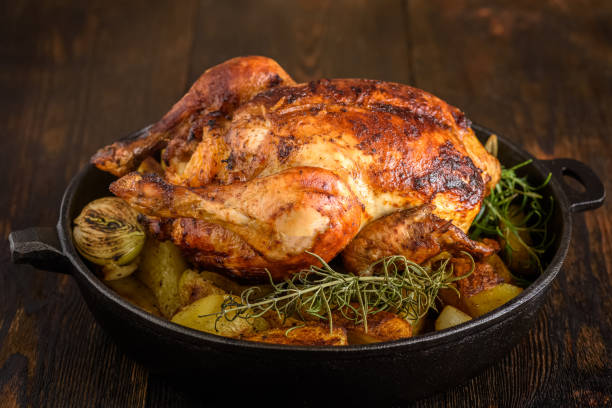 Image de la recette de Poulet rôti pommes de terre/oignons