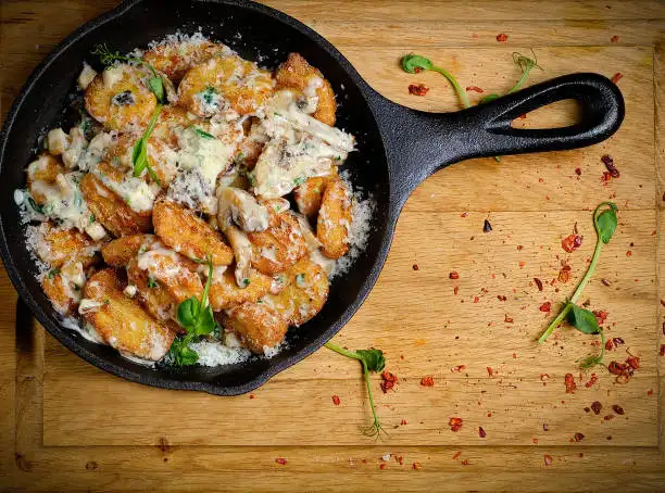 Gnocchi poêlés aux champignons et parmesan